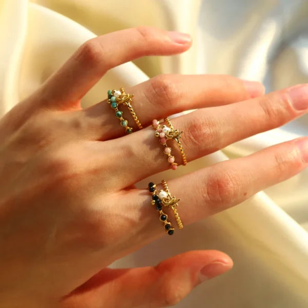 Bague Breloque Pierres Roses et Charme Solaire Blanc