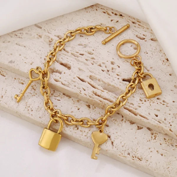 Bracelet à Breloques Cadenas Doré et Clé