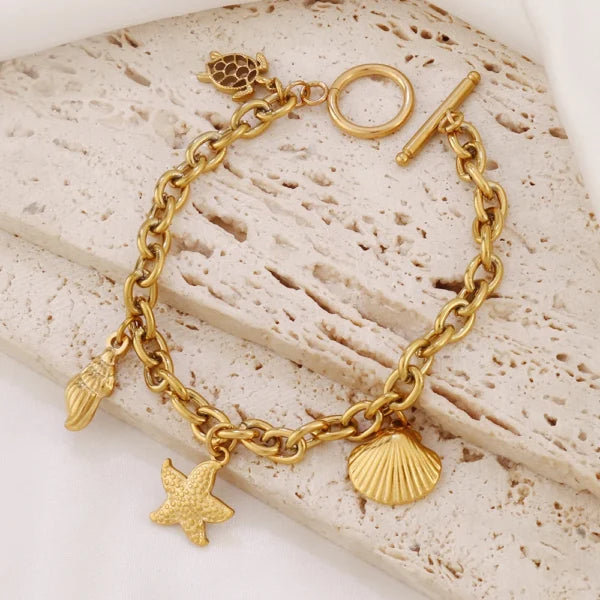 Bracelet breloques Étoile de Mer et Tortue Dorée