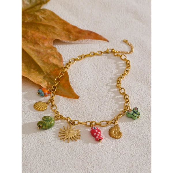 Collier à Breloques Soleil Doré et Nuances Océaniques