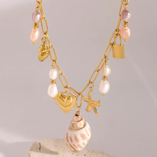 Collier à breloques coquillage blanc et rose
