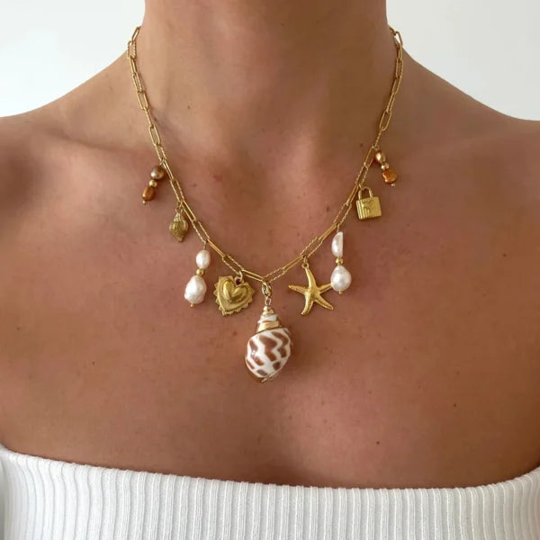 Collier à breloques coquillage blanc et rose