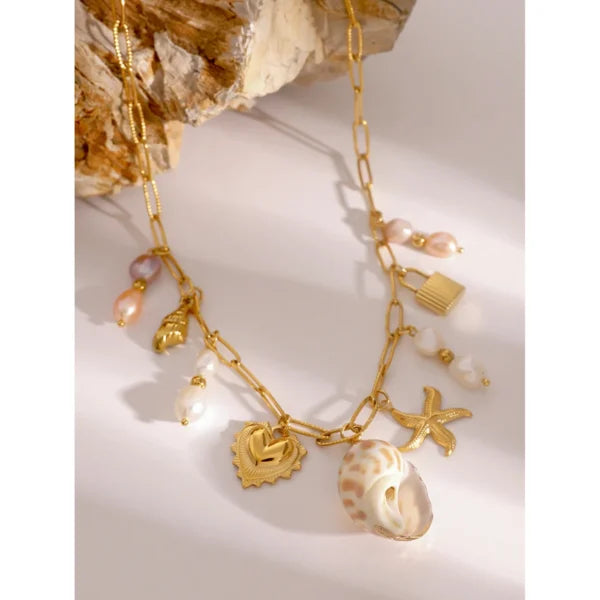 Collier à breloques coquillage blanc et rose