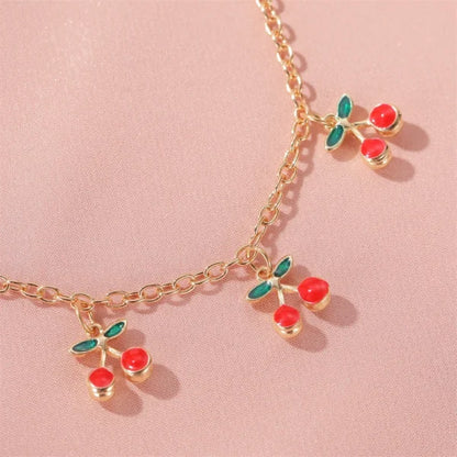 Bracelet à Breloques Cerises Dorées