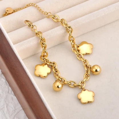 Bracelet à breloques Trèfles et Grelots Dorés