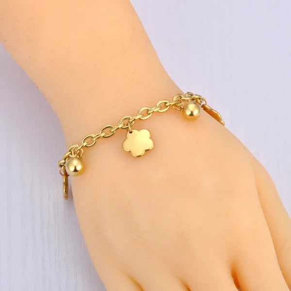 Bracelet à breloques Trèfles et Grelots Dorés