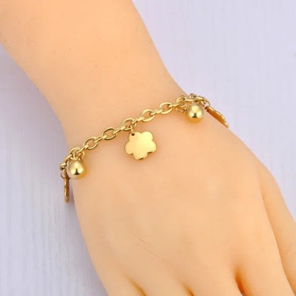 Bracelet à breloques Trèfles et Grelots Dorés