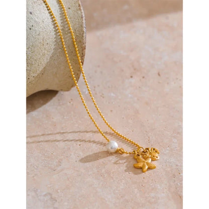 Collier à Breloques Perle, Étoile et Crabe Doré