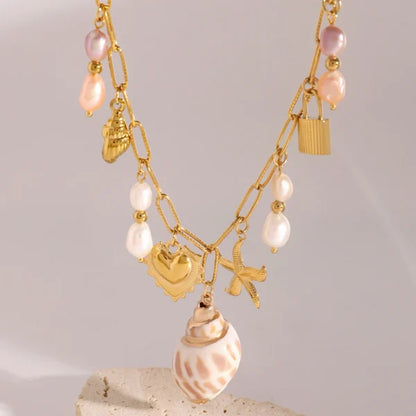 Collier à breloques coquillage blanc et rose