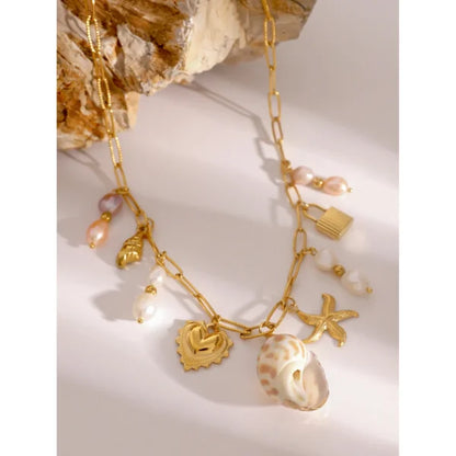 Collier à breloques coquillage blanc et rose