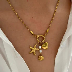 Collier à Breloques  Étoile, Cœur et Grelot dorées