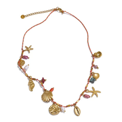 Collier à Breloques Coquillages Dorés