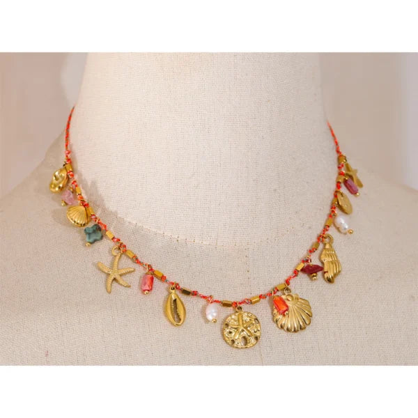 Collier à Breloques Coquillages Dorés