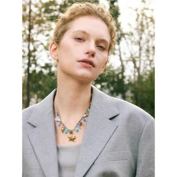 Collier breloques Corail Bleu et Doré