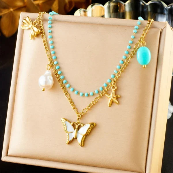 Double collier à breloques avec Papillon Blanc et Perle